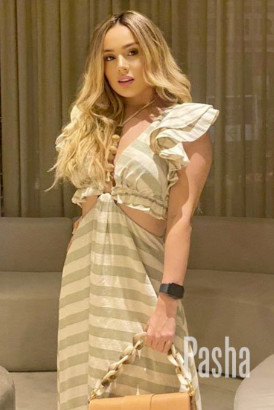 Very pretty young blond Brazilian in a stylish striped dress