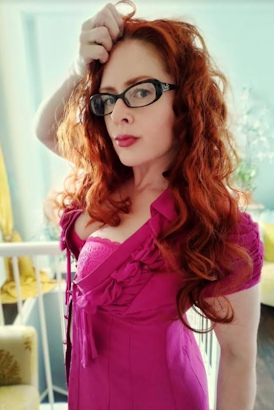 Petite redhead independent companion