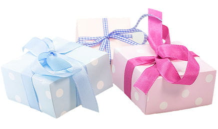 Three beautifully wrapped gift boxes
