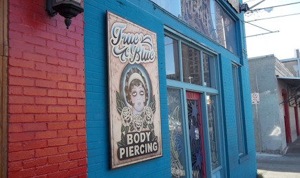 Tattoo artist's shop blue painted shop front